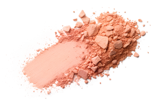 A scattering of peach-colored blush powder, creating a dynamic makeup sample with a smooth brush stroke on a white background