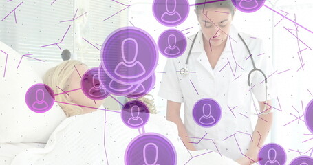 Observing medical professional examining patient in hospital bed, with purple network overlay