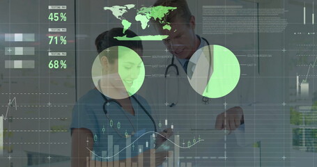 Reviewing tablet data nurse and doctor collaborating in clinic workspace, with global health data