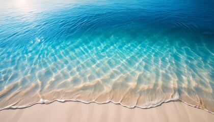 Obraz premium crystal clear blue sea water surface with sunlit ripples tropical nature vertical background rippled effect on sand beach backdrop with sunlight reflection underwater transparent aqua texture