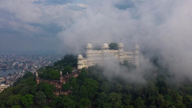 The Monsoon Palace amidst the Clouds The majestic building almost ethereal in Udaipur, India travel