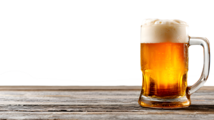 Refreshing glass of cold beer with frothy foam on rustic wooden table for celebration