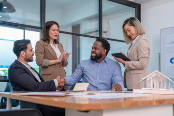 multiracial business team,executives board group working on corporate property investment having discussion on conference table,agreement,boss,shaking hands in meeting room