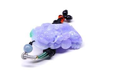 Lavender Jade. Natural lavender jadeite Jade Pixiu pendant isolated on white background. Purple jade from Myanmar 