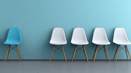 Waiting chairs in a row, one stands out.