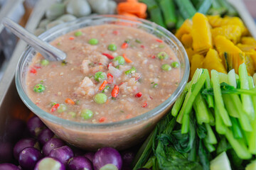 Thai spicy shrimp paste dipping sauce. and organic vegetables. Thai food culture.