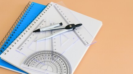 教育イメージ　文房具　ノートと三角定規　コピースペース　16:9