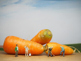 Mini toy of action figure at table with blurred background. Miniature photography concept design....