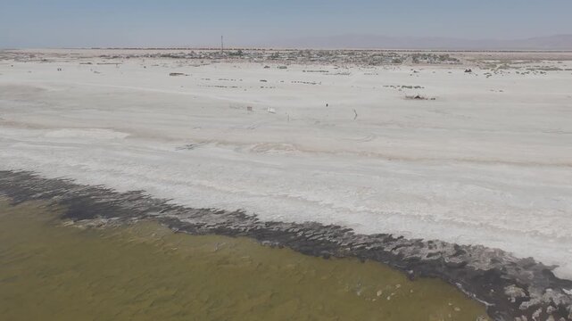 Raw D-Log Drone Footage of Dry Shoreline and Contaminated Water at Bombay Beach Salton Sea California