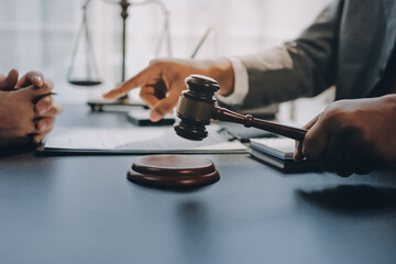 Lawyer explained to the client about the law that must be brought against the court case.