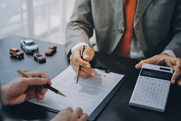 Car salesman gave the keys to the customers who signed the purchase contract legally, Successful...