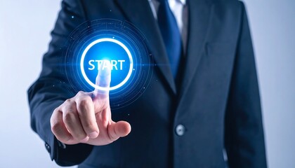 Businessman pressing a holographic start button