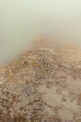 Minimalist Shoreline with Neutral Sand and Water