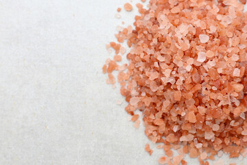 Pink Himalayan salt, Natural pink salt grains used for cooking.
