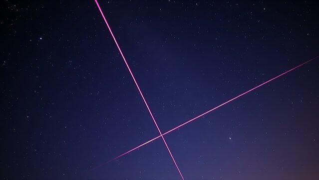 Double-exposure night sky with intersecting vibrant meteor trails, representing celestial events.