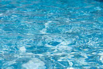 Fototapeta premium Blue ripped water in swimming pool, water pool texture and surface water backgraund.