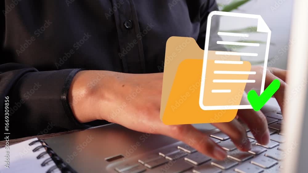 Poster file management and organization. visual detail of an executive using her laptop in the office, with