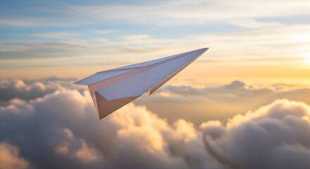 Fototapeta premium Paper airplane soaring through the sky above clouds at sunset, symbolizing travel, dreams, freedom, and imagination