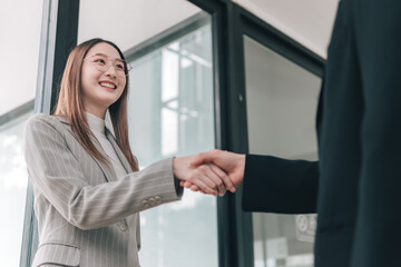 Partnership perspective success in business meetings with professional handshakes in modern offices