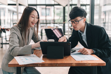 Collaborative meeting between colleagues modern office work context engaging atmosphere close-up view teamwork concept