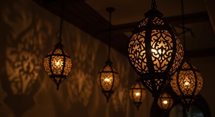 Intricate, Illuminated Lanterns Cast Soft Shadows in a Dark Interior
