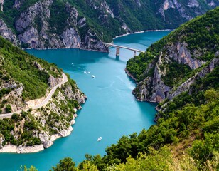 Turquoise lake winding through mountains