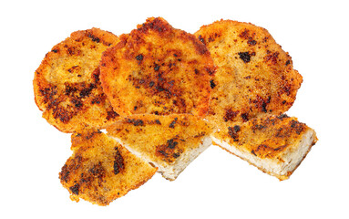 pile of golden, crispy fried cutlets, one sliced