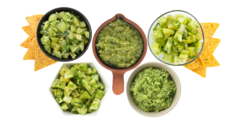 enticing range of green salsa with tortilla chips on black