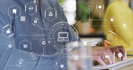 Mid adult man typing keyboard and starting headset call while displaying animated IT service icons - Powered by Adobe