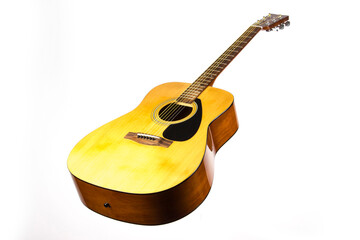 dreadnought six-string acoustic guitar made of light wood on a white background. an isolated...