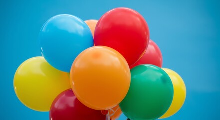 Colorful balloons against blue background