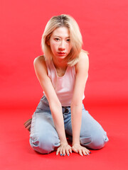 Asian fashion portrait young beautiful cheerful cute woman, blonde short hair wearing white tank...