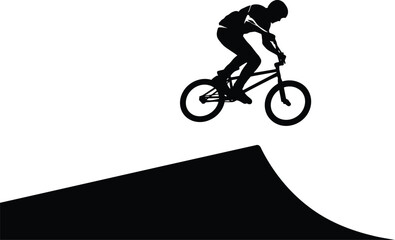Fototapeta premium BMX biker launching from ramp silhouette for extreme sports designs