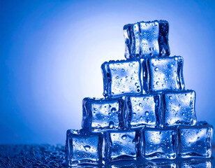 Macro of realistic ice cubes stacked in pyramid under blue glowing light