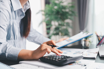 Business woman analyze calculate company financial, tax results office accounting statistics...