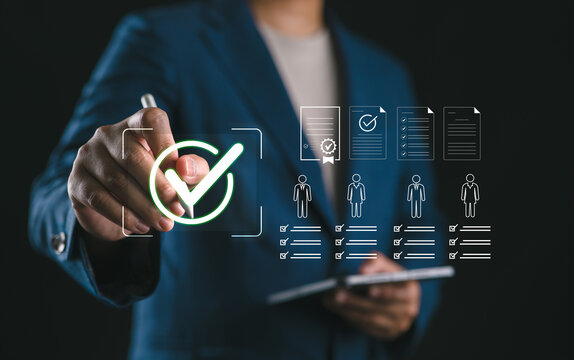 Businessman selecting a candidate with check mark on a virtual interface, concept of hiring approval, digital recruitment system, employee evaluation and HR management technology.