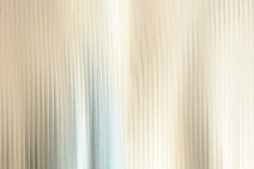 Obraz premium A textured background with vertical ribbed patterns and a subtle gradient of light and shadow, creating a sense of depth and abstract elegance
