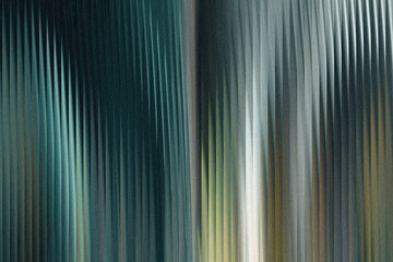 Obraz premium A textured abstract background with vertical lines and a gradient of teal, green, and gray colors, creating a sense of depth and movement