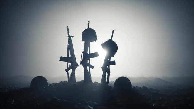 A somber tribute to fallen soldiers: Rifles and helmets stand as a poignant memorial under a dark sky, symbolizing sacrifice and remembrance.