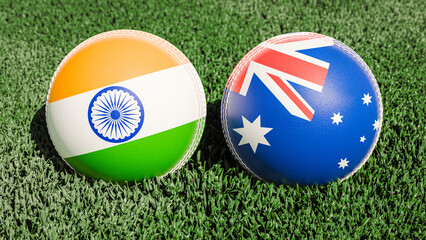 Two cricket balls featuring the flags of India and Australia, on a grassy field