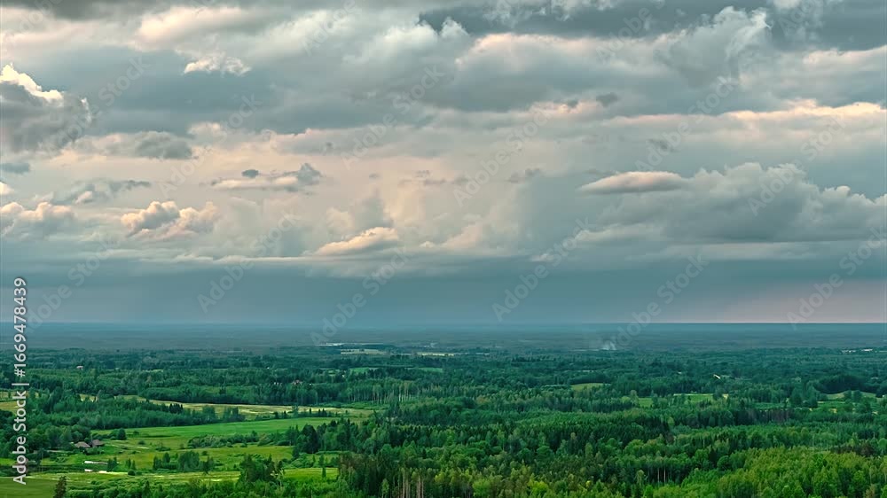 Aufkleber dynamic clouds over lush landscape in hyperlapse creating serene mood