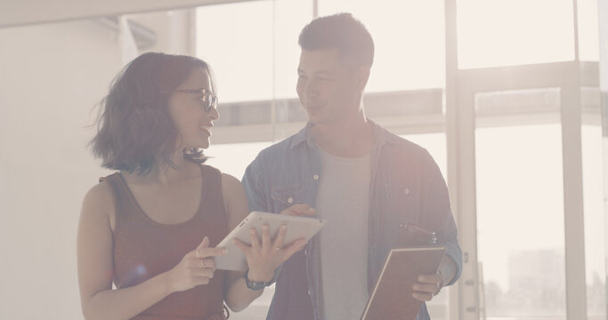 Tablet, research and team with business people in office for planning, social media marketing or email. Public relations agent, campaign engagement report and partner with employees in startup agency