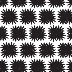 A seamless black and white starburst floral pattern with repeating geometric shapes, perfect for textile design, fabric prints, wallpaper, wrapping paper, digital backgrounds, and modern surface decor