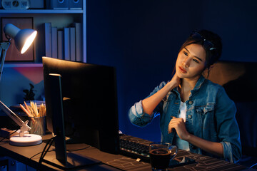 Young beautiful Asian businesswoman taking break with stretching body with ache symptom for...