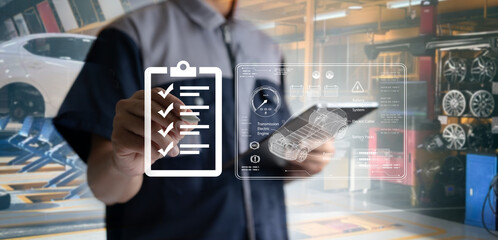 Auto mechanics use tablets with state-of-the-art interactive diagnostic software to find faulty...