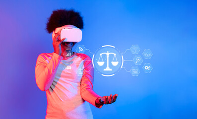 A woman using virtual reality technology engages with digital representations of legal scales,...