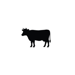 A black silhouette of a cow standing on a white background