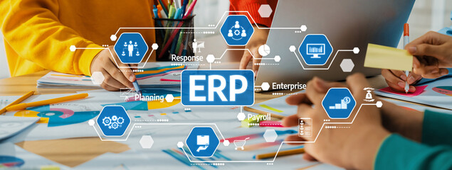 Engaging office environment showcasing teamwork and digital solutions focused on ERP systems, enhancing strategies and processes for effective enterprise management. Amity