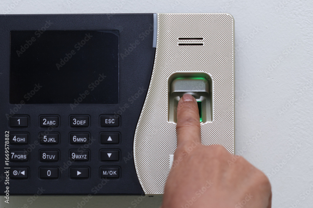 Poster fingerprint scanner technology provides secure access control. this showcases hand pressing fingerpr