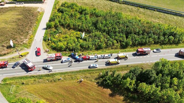 Fire trucks and ambulances at accident site,